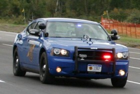 Michigan state trooper police car with red lights flashing