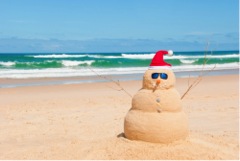 Sand snowman on the beach