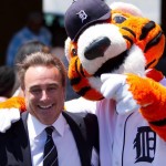 Scott Goodwin smiling with Detroit Tigers mascot