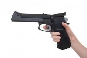 Hand pointing gun with finger on trigger