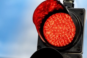 Illuminated red light of traffic light