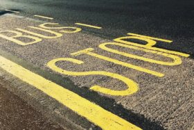 Bus Stop lane painted on a road.