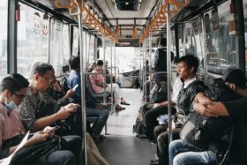 People sitting on a bus.